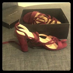 Strap wrap around heels. Never worn!